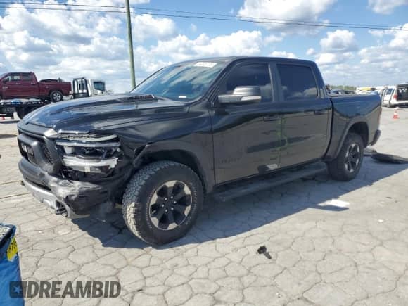 2020 Ram 1500 Rebel z VIN 1C6SRFLM2LN271477, wystawiony jako Copart lot #84295705 z przebiegiem 116 217 mil mil oraz Szkoda całkowita • Salvage title. Historia ofert i sprzedaży dostępna na DreamBid. Obrazek 1.