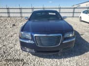 ✅ 2014 Chrysler 300 C • VIN: 2C3CCAKG3EH201211 • Лот: 87437655. Опубликован ранее на Copart с пробегом 129 585 миль. Бесплатный доступ к архиву аукционных продаж из США и подробный отчёт об истории автомобиля на DreamBid. Изображение 5.