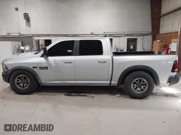 ✅ 2016 Ram 1500 Rebel • VIN: 1C6RR7YT3GS351611 • Lot: 43718492. Listed on IAAI with 133,690 mi. Free auction sales archive from the USA and detailed vehicle history report at DreamBid. Image 14.