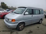 ✅ 2003 Volkswagen EuroVan MV • VIN: WV2NB47053H028929 • Lot: 86028064. Wystawiony na Copart z przebiegiem 98 622 mil. Bezpłatny archiwum sprzedaży aukcyjnych z USA i szczegółowy raport historii pojazdu na DreamBid. Zdjęcie 1.