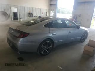 ✅ 2023 Hyundai Sonata SEL Plus • VIN: KMHL44J22PA278441 • Лот: 65542985. Опубликован ранее на Copart с пробегом 58 909 миль. Бесплатный доступ к архиву аукционных продаж из США и подробный отчёт об истории автомобиля на DreamBid. Изображение 3.