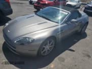 ✅ 2007 Aston Martin Vantage • VIN: SCFBF04B27GD06691 • Лот: 60060835. Опубликован ранее на Copart с пробегом 17 988 миль. Бесплатный доступ к архиву аукционных продаж из США и подробный отчёт об истории автомобиля на DreamBid. Изображение 1.