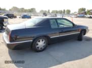 ✅ 2002 Cadillac Eldorado ESC • VIN: 1G6EL12Y02B105346 • Лот: 80357645. Опубликован ранее на Copart с пробегом 58 274 миль. Бесплатный доступ к архиву аукционных продаж из США и подробный отчёт об истории автомобиля на DreamBid. Изображение 3.