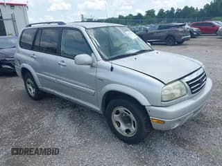 ✅ 2002 Suzuki XL7 Standard • VIN: JS3TX92V624124535 • Lot: 42522274. Listed on IAAI with 180,814 mi. Free auction sales archive from the USA and detailed vehicle history report at DreamBid. Image 1.