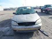 ✅ 2006 Ford Focus S • VIN: 1FAFP34N96W104334 • Lot: 43656425. Listed on IAAI with 131,370 mi. Free auction sales archive from the USA and detailed vehicle history report at DreamBid. Image 13.