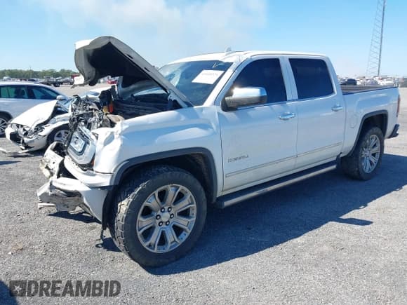✅ 2017 GMC Sierra 1500 Denali • VIN: 3GTU2PEJ0HG147836 • Lot: 43410221. Listed on IAAI with 98,619 mi. Free auction sales archive from the USA and detailed vehicle history report at DreamBid. Image 2.