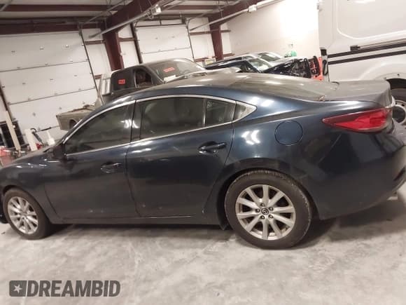 ✅ 2015 Mazda 6 i Sport • VIN: JM1GJ1U58F1205107 • Lot: 43610728. Wystawiony na IAAI z przebiegiem 139 227 mil. Bezpłatny archiwum sprzedaży aukcyjnych z USA i szczegółowy raport historii pojazdu na DreamBid. Zdjęcie 14.