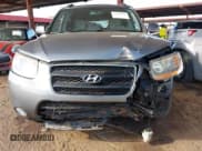 ✅ 2009 Hyundai Santa Fe GL • VIN: 5NMSG73E79H263961 • Lot: 41419880. Listed on IAAI with 165,964 mi. Free auction sales archive from the USA and detailed vehicle history report at DreamBid. Image 13.