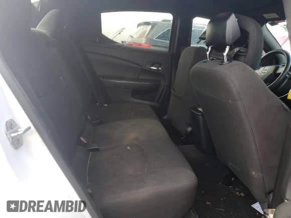 2013 Dodge Avenger SE z VIN 1C3CDZAB0DN592146, wystawiony jako Copart lot #82248105 z przebiegiem 219 706 mil mil oraz Szkoda całkowita • Salvage title. Historia ofert i sprzedaży dostępna na DreamBid. Obrazek 10.