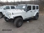✅ 2013 Jeep Wrangler Unlimited Sahara • VIN: 1C4HJWEG6DL693380 • Lot: 43645609. Wystawiony na IAAI z przebiegiem 124 086 mil. Bezpłatny archiwum sprzedaży aukcyjnych z USA i szczegółowy raport historii pojazdu na DreamBid. Zdjęcie 2.