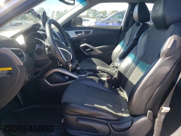 ✅ 2013 Hyundai Veloster w/Gray Int • VIN: KMHTC6AD4DU134495 • Lot: 75985954. Wystawiony na Copart z przebiegiem 139 819 mil. Bezpłatny archiwum sprzedaży aukcyjnych z USA i szczegółowy raport historii pojazdu na DreamBid. Zdjęcie 7.