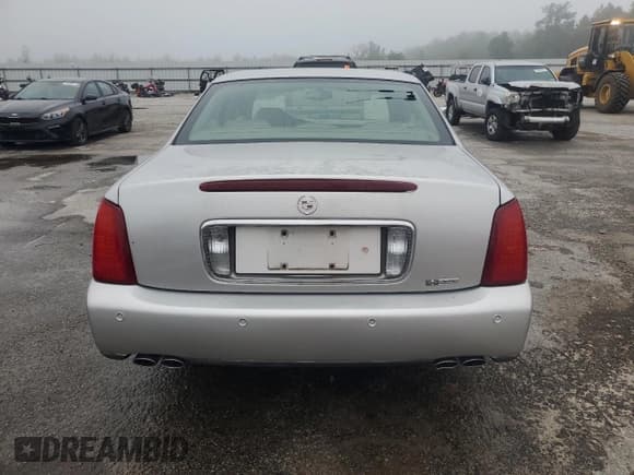 ✅ 2004 Cadillac DeVille DHS • VIN: 1G6KE57Y14U179606 • Lot: 57988325. Listed on Copart with 115,659 mi. Free auction sales archive from the USA and detailed vehicle history report at DreamBid. Image 6.