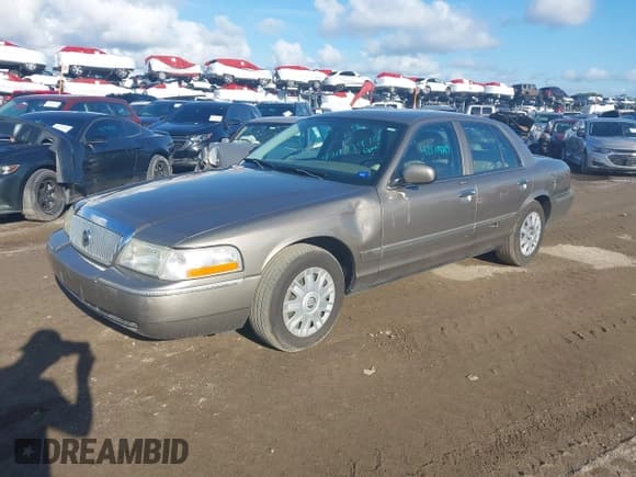 ✅ 2004 Mercury Grand Marquis GS • VIN: 2MEFM74WX4X696703 • Лот: 42171970. Опубликован ранее на IAAI с пробегом 149 556 миль. Бесплатный доступ к архиву аукционных продаж из США и подробный отчёт об истории автомобиля на DreamBid. Изображение 2.