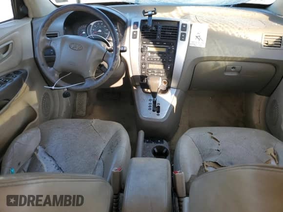 2006 Hyundai Tucson GLS z VIN KM8JN12D56U350295, wystawiony jako Copart lot #77243594 z przebiegiem 192 335 mil mil oraz Szkoda całkowita • Salvage title. Historia ofert i sprzedaży dostępna na DreamBid. Obrazek 8.