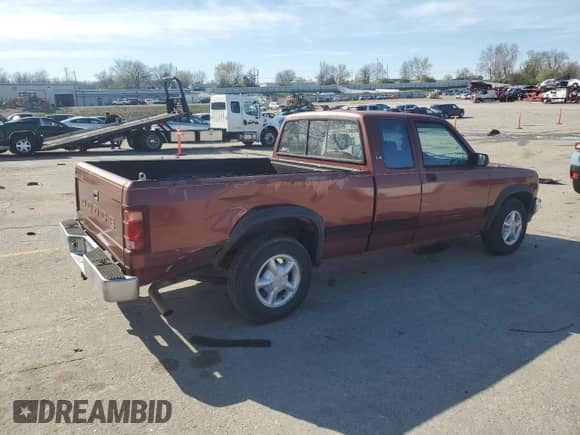 1992 Dodge Dakota с VIN 1B7GL23YXNS633409, выставлен на аукционе Copart как лот 51067775 с пробегом 153 174 миль миль и Списание • Salvage title. История ставок и продаж доступна на DreamBid. Изображение 3.