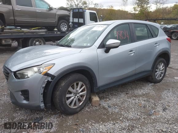 ✅ 2016 Mazda CX-5 Sport • VIN: JM3KE4BY4G0620727 • Лот: 43487804. Опубликован ранее на IAAI с пробегом 123 221 миль. Бесплатный доступ к архиву аукционных продаж из США и подробный отчёт об истории автомобиля на DreamBid. Изображение 2.
