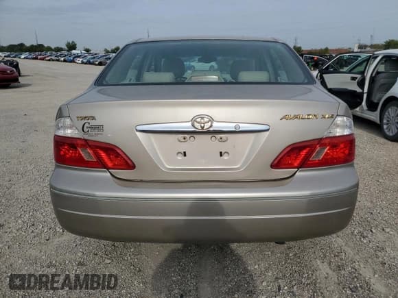 ✅ 2003 Toyota Avalon XLS • VIN: 4T1BF28BX3U271861 • Лот: 84263985. Опубликован ранее на Copart с пробегом 203 041 миль. Бесплатный доступ к архиву аукционных продаж из США и подробный отчёт об истории автомобиля на DreamBid. Изображение 6.