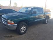 ✅ 2000 Dodge Dakota Sport • VIN: 1B7HG2AZ4YS724393 • Lot: 43645937. Wystawiony na IAAI z przebiegiem 144 705 mil. Bezpłatny archiwum sprzedaży aukcyjnych z USA i szczegółowy raport historii pojazdu na DreamBid. Zdjęcie 2.