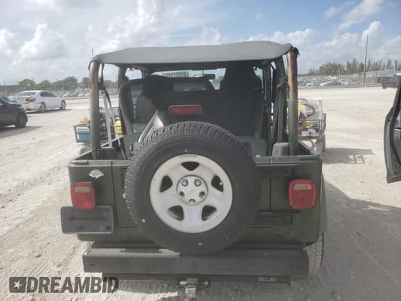 ✅ 2006 Jeep Wrangler SE • VIN: 1J4FA29196P754586 • Лот: 61381785. Опубликован ранее на Copart с пробегом 171 029 миль. Бесплатный доступ к архиву аукционных продаж из США и подробный отчёт об истории автомобиля на DreamBid. Изображение 6.