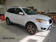 ✅ 2011 Hyundai Santa Fe SE • VIN: 5XYZHDAG5BG046293 • Lot: 82055114. Listed on Copart with 245,922 mi. Free auction sales archive from the USA and detailed vehicle history report at DreamBid. Image 4.