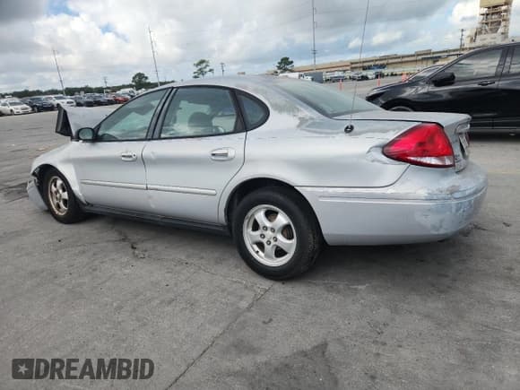 ✅ 2005 Ford Taurus SE • VIN: 1FAFP53U85A254273 • Лот: 91710635. Опубликован ранее на Copart с пробегом Не указан. Бесплатный доступ к архиву аукционных продаж из США и подробный отчёт об истории автомобиля на DreamBid. Изображение 2.