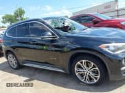 ✅ 2017 BMW X1 xDrive28i • VIN: WBXHT3Z31H4A52403 • Лот: 42565421. Опубликован ранее на IAAI с пробегом 95 031 миль. Бесплатный доступ к архиву аукционных продаж из США и подробный отчёт об истории автомобиля на DreamBid. Изображение 13.