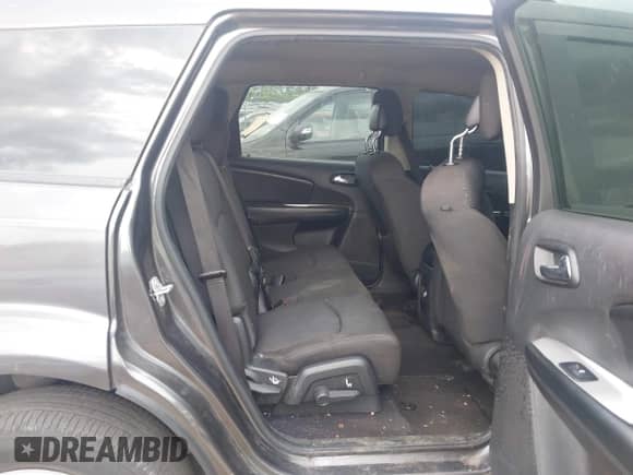 2017 Dodge Journey SE with VIN 3C4PDCAB2HT636910, listed as a IAAI auction lot 43095502 with 173,852 mi miles and . Bid and sale history available at DreamBid. Image 8.