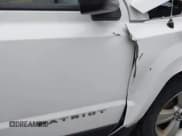 ✅ 2014 Jeep Patriot Latitude • VIN: 1C4NJPFB5ED533403 • Лот: 43738438. Опубликован ранее на IAAI с пробегом 176 057 миль. Бесплатный доступ к архиву аукционных продаж из США и подробный отчёт об истории автомобиля на DreamBid. Изображение 18.