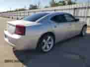 2006 Dodge Charger с VIN 2B3KA43G06H390223, выставлен на аукционе Copart как лот 77042244 с пробегом 174 786 миль миль и На запчасти • Non repairable. История ставок и продаж доступна на DreamBid. Изображение 3.