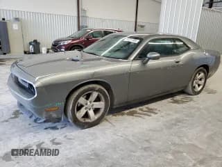 ✅ 2012 Dodge Challenger SXT • VIN: 2C3CDYAG1CH174885 • Lot: 44727385. Wystawiony na Copart z przebiegiem 219 845 mil. Bezpłatny archiwum sprzedaży aukcyjnych z USA i szczegółowy raport historii pojazdu na DreamBid. Zdjęcie 1.