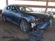 ✅ 2020 Mazda CX-9 Grand Touring • VIN: JM3TCADY0L0412697 • Lot: 43570985. Listed on IAAI with 59,725 mi. Free auction sales archive from the USA and detailed vehicle history report at DreamBid. Image 1.