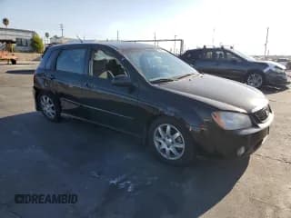 ✅ 2006 Kia Spectra • VIN: KNAFE162165347114 • Лот: 70068094. Опубликован ранее на Copart с пробегом 119 780 миль. Бесплатный доступ к архиву аукционных продаж из США и подробный отчёт об истории автомобиля на DreamBid. Изображение 4.