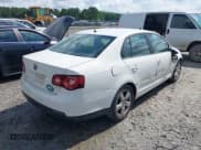 ✅ 2009 Volkswagen Jetta S • VIN: 3VWJZ71K29M123468 • Lot: 42885528. Listed on IAAI with 167,589 mi. Free auction sales archive from the USA and detailed vehicle history report at DreamBid. Image 4.