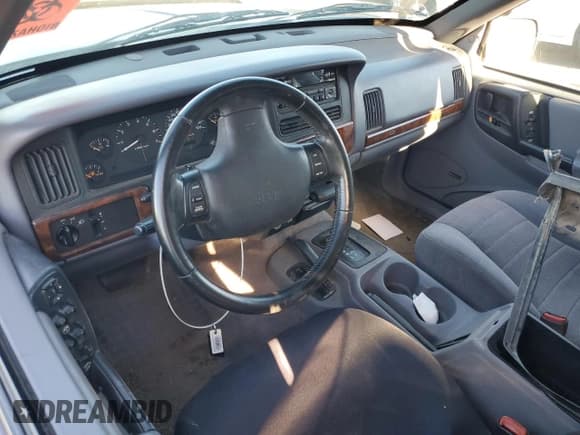 ✅ 1996 Jeep Grand Cherokee Laredo • VIN: 1J4GZ58S4TC213568 • Lot: 85765615. Listed on Copart with Not provided. Free auction sales archive from the USA and detailed vehicle history report at DreamBid. Image 8.