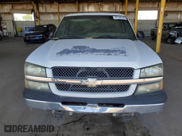 2004 Chevrolet Silverado 1500 LS z VIN 1GCEC14V54Z196818, wystawiony jako Copart lot #57126145 z przebiegiem Nie podano mil oraz Szkoda całkowita • Salvage title. Historia ofert i sprzedaży dostępna na DreamBid. Obrazek 5.