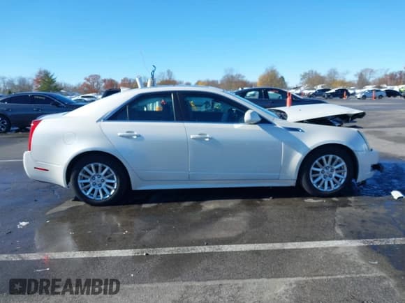 ✅ 2012 Cadillac CTS • VIN: 1G6DC5E59C0136399 • Лот: 43614383. Опубликован ранее на IAAI с пробегом 140 539 миль. Бесплатный доступ к архиву аукционных продаж из США и подробный отчёт об истории автомобиля на DreamBid. Изображение 13.