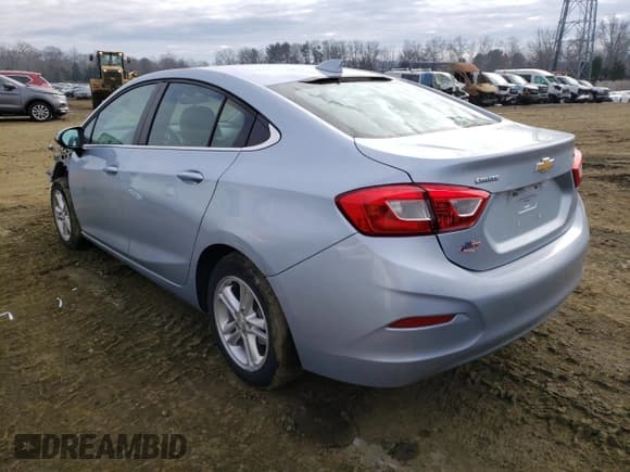 ✅ 2018 Chevrolet Cruze LT • VIN: 1G1BE5SM6J7113508 • Lot: 38336673. Listed on Copart with 25,958 mi. Free auction sales archive from the USA and detailed vehicle history report at DreamBid. Image 2.