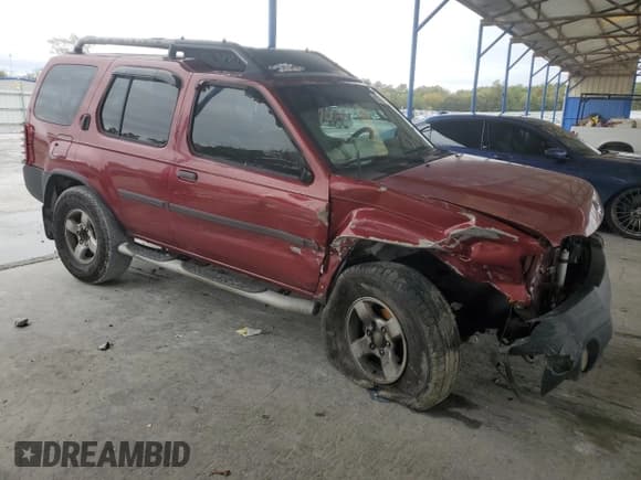 ✅ 2004 Nissan Xterra XE • VIN: 5N1ED28T04C601137 • Lot: 90307235. Listed on Copart with 166,089 mi. Free auction sales archive from the USA and detailed vehicle history report at DreamBid. Image 4.