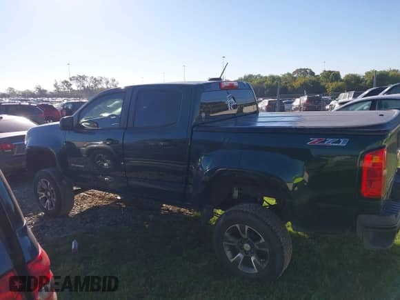 2015 Chevrolet Colorado 4WD Z71 with VIN 1GCGTCE33F1195993, listed as a IAAI auction lot 43435964 with 225,869 mi miles and . Bid and sale history available at DreamBid. Image 14.