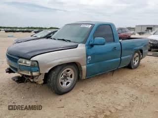 2002 Chevrolet Silverado 1500 with VIN 1GCEC14W22Z220823, listed as a Copart auction lot 65223415 with 263,709 mi miles and Salvage title. Bid and sale history available at DreamBid. Image 1.