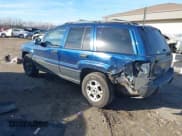 ✅ 2001 Jeep Grand Cherokee Laredo • VIN: 1J4GW48S01C699585 • Lot: 43744180. Listed on IAAI with 219,402 mi. Free auction sales archive from the USA and detailed vehicle history report at DreamBid. Image 3.