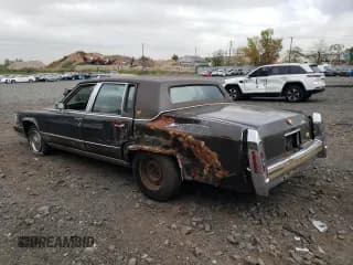 ✅ 1991 Cadillac Brougham • VIN: 1G6DW54EXMR701457 • Lot: 70194104. Wystawiony na Copart z przebiegiem Nie podano. Bezpłatny archiwum sprzedaży aukcyjnych z USA i szczegółowy raport historii pojazdu na DreamBid. Zdjęcie 2.
