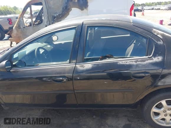 2005 Dodge Neon SXT z VIN 1B3ES56C85D143830, wystawiony jako IAAI lot #41990483 z przebiegiem 205 947 mil mil oraz . Historia ofert i sprzedaży dostępna na DreamBid. Obrazek 14.