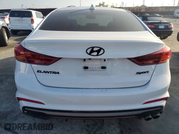 2018 Hyundai Elantra Sport с VIN KMHD04LB9JU704015, выставлен на аукционе Copart как лот 90088295 с пробегом Не указан миль и На запчасти • Non repairable. История ставок и продаж доступна на DreamBid. Изображение 6.