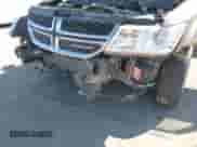 2015 Dodge Journey American Value z VIN 3C4PDCAB7FT559299, wystawiony jako IAAI lot #43409195 z przebiegiem 183 905 mil mil oraz . Historia ofert i sprzedaży dostępna na DreamBid. Obrazek 6.