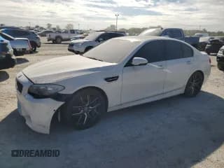 ✅ 2013 BMW M5 • VIN: WBSFV9C55DD095444 • Lot: 71600874. Wystawiony na Copart z przebiegiem 68 764 mil. Bezpłatny archiwum sprzedaży aukcyjnych z USA i szczegółowy raport historii pojazdu na DreamBid. Zdjęcie 1.