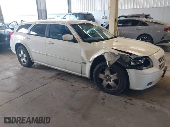2006 Dodge Magnum SXT with VIN 2D4GZ47V56H344931, listed as a IAAI auction lot 41301668 with 132,916 mi miles and . Bid and sale history available at DreamBid. Image 1.