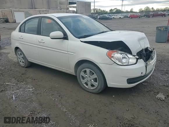 2010 Hyundai Accent GLS z VIN KMHCN4AC7AU430323, wystawiony jako Copart lot #79679514 z przebiegiem 115 579 mil mil oraz Szkoda całkowita • Salvage title. Historia ofert i sprzedaży dostępna na DreamBid. Obrazek 11.