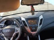 ✅ 2012 Hyundai Veloster w/Gray Int • VIN: KMHTC6AD4CU023542 • Lot: 84908764. Listed on Copart with 131,352 mi. Free auction sales archive from the USA and detailed vehicle history report at DreamBid. Image 8.