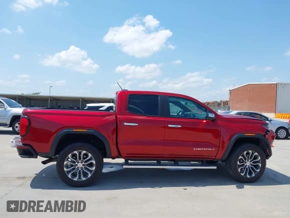 ✅ 2023 GMC Canyon 4WD Denali • VIN: 1GTP6FEK2P1238009 • Лот: 42365436. Опубликован ранее на IAAI с пробегом 24 225 миль. Бесплатный доступ к архиву аукционных продаж из США и подробный отчёт об истории автомобиля на DreamBid. Изображение 13.